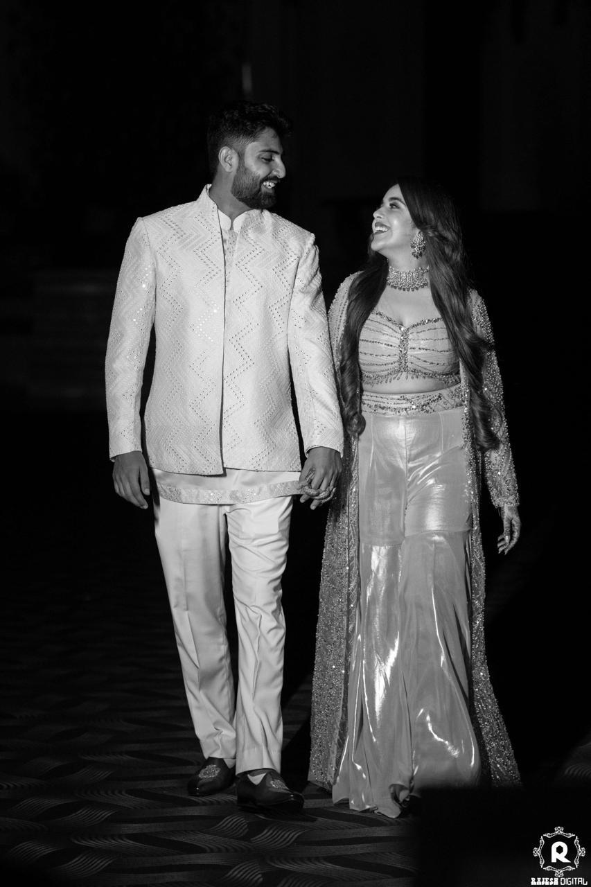 Himanshi and Anupam smiling at each other